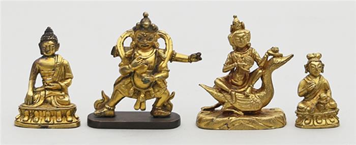 Vier tibetische Miniatur-Skulpturen.