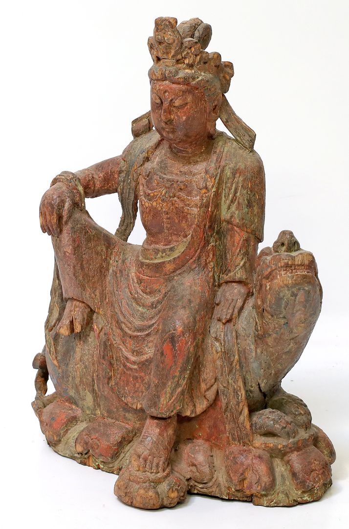 Ming-Skulptur Guanyin auf einem Löwen.
