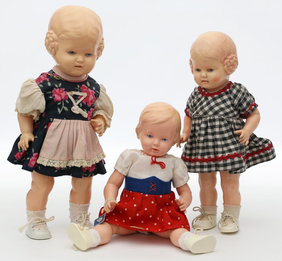 3 Zelluloid-Puppen.