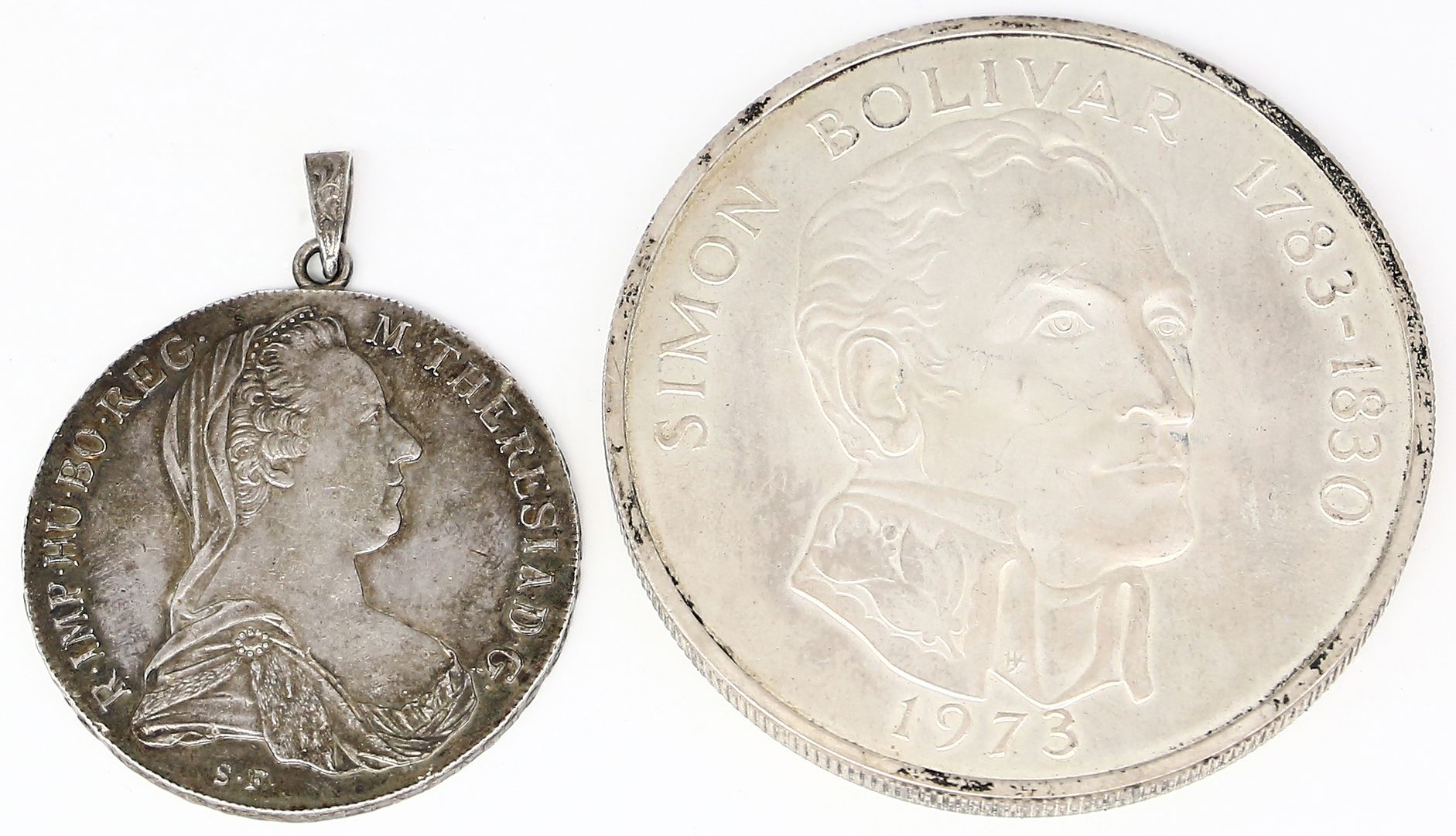 Große Silbermünze und -medaille.