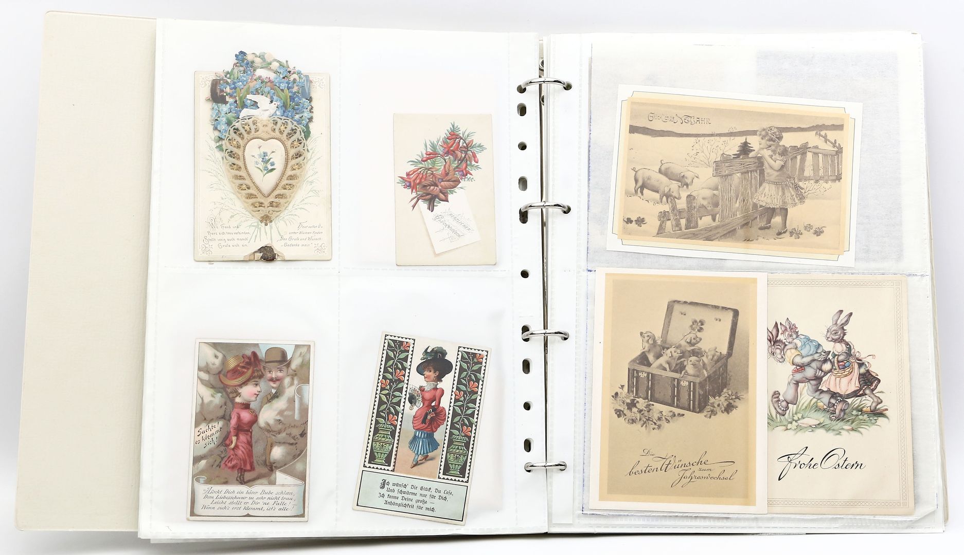 Sammlung von ca. 89 Post-, Glückwunsch- und Kullissenkarten sowie 6 Bögen Oblatenbilder.